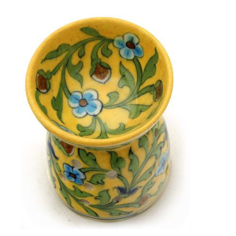 Turquoise flowers with green leaves on a yellow base ceramic blue pottery aroma diffuser
